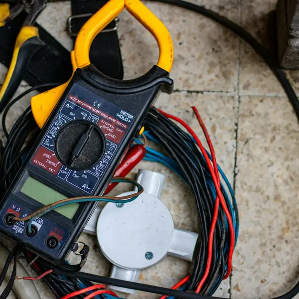 Clamp meter used to check an appliance circuit